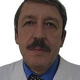 Врач Кожевников Юрий Иванович